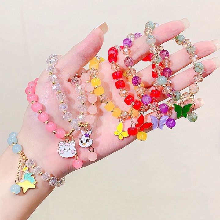 Colorful bracelets on a hand